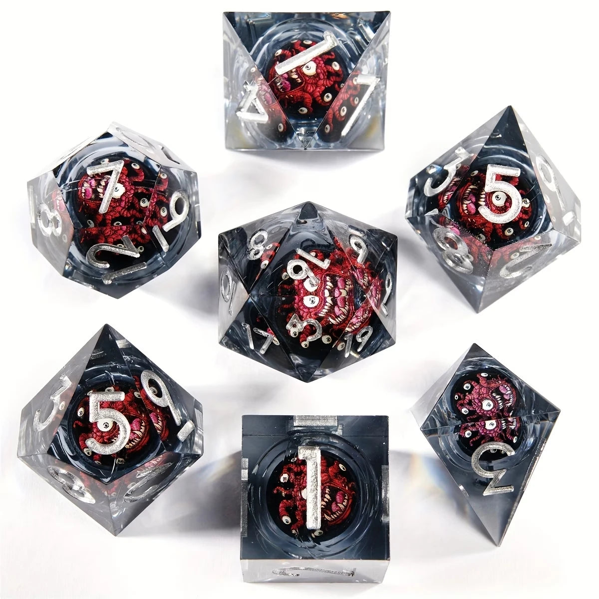 Beholder 7-piece liquid core dice set on white